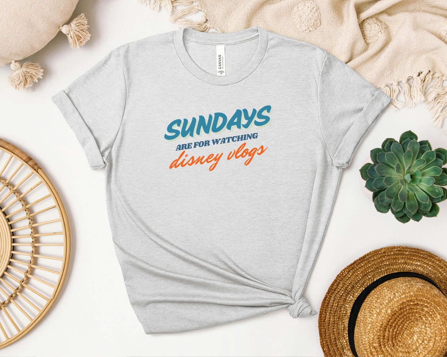 bella and canvas 3001 in ash with 'sundays are for watching Disney vlogs' print on chest inspired by Disney YouTube