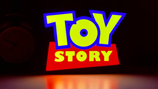Toy Story logo with colorful text on a dark background